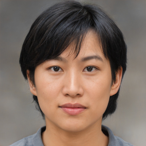 Neutral asian young-adult female with medium  brown hair and brown eyes