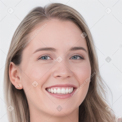 Joyful white young-adult female with long  brown hair and blue eyes