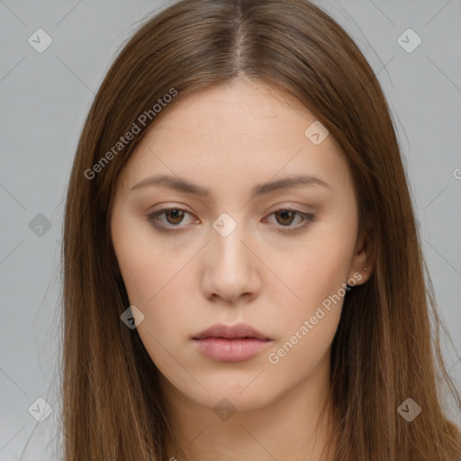 Neutral white young-adult female with long  brown hair and brown eyes