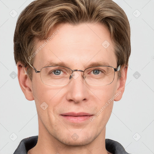 Joyful white adult male with short  brown hair and grey eyes