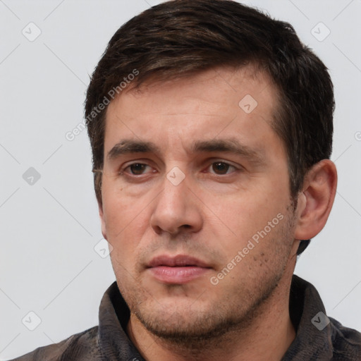 Neutral white adult male with short  brown hair and brown eyes