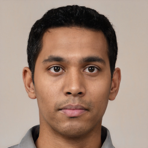 Neutral latino young-adult male with short  black hair and brown eyes