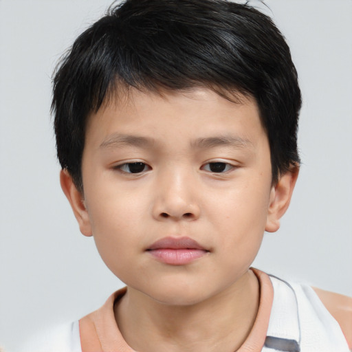 Neutral asian child male with short  brown hair and brown eyes