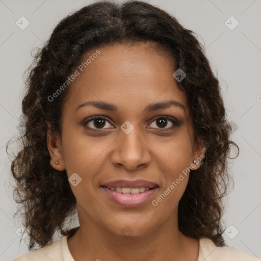 Joyful black young-adult female with medium  brown hair and brown eyes