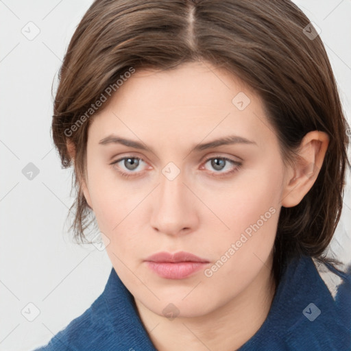 Neutral white young-adult female with medium  brown hair and grey eyes