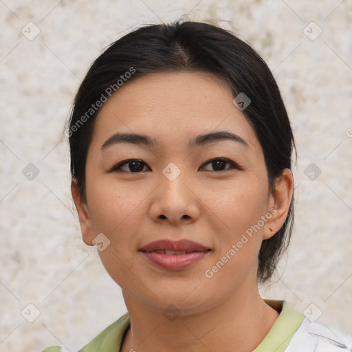 Joyful asian young-adult female with medium  brown hair and brown eyes