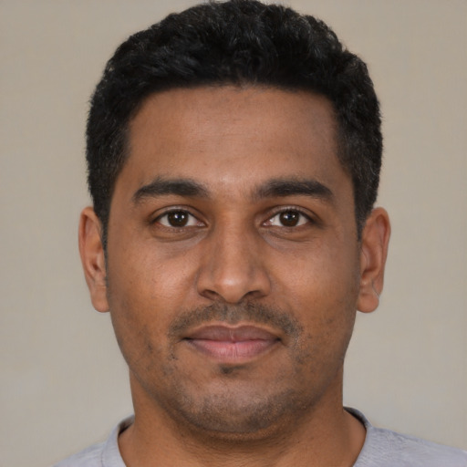 Neutral black young-adult male with short  black hair and brown eyes