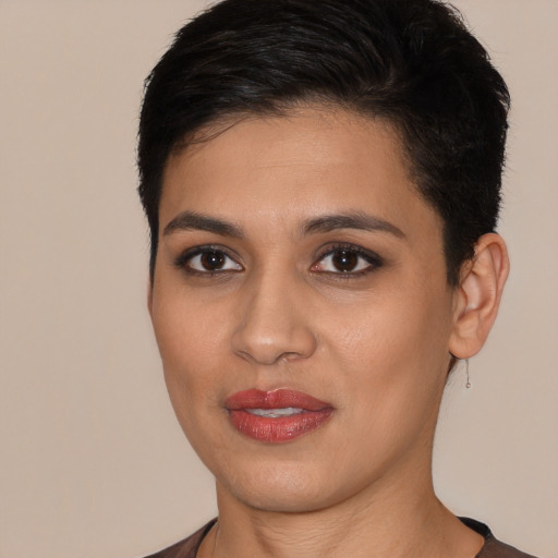 Joyful white young-adult female with short  brown hair and brown eyes