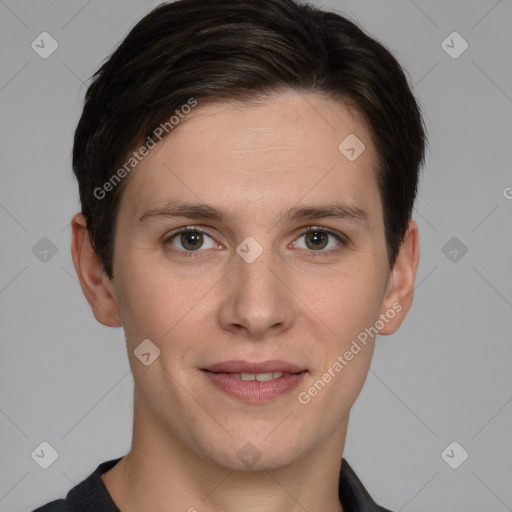 Joyful white young-adult male with short  brown hair and grey eyes