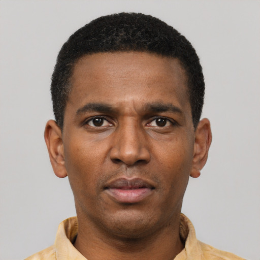 Neutral latino young-adult male with short  brown hair and brown eyes