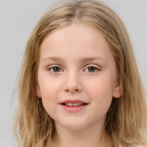 Joyful white child female with medium  brown hair and blue eyes