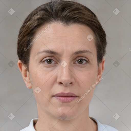 Joyful white adult female with short  brown hair and brown eyes