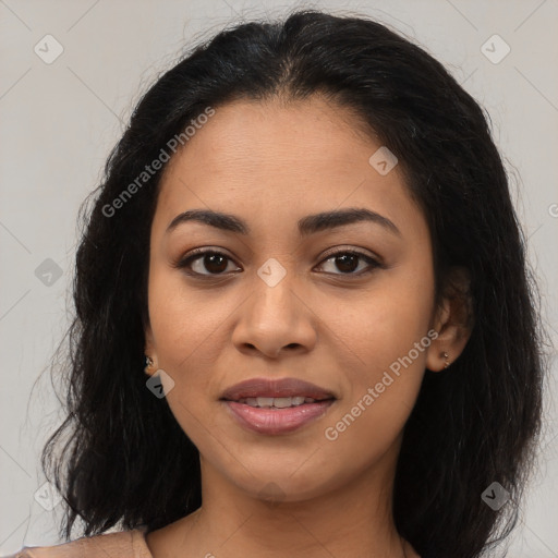 Joyful latino young-adult female with long  brown hair and brown eyes