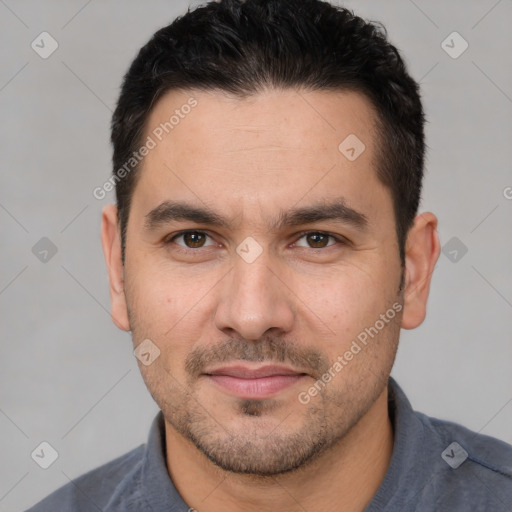 Joyful white adult male with short  brown hair and brown eyes