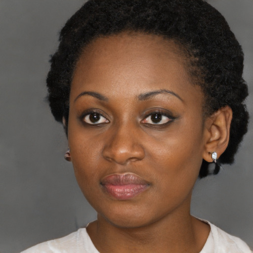 Neutral black young-adult female with short  brown hair and brown eyes