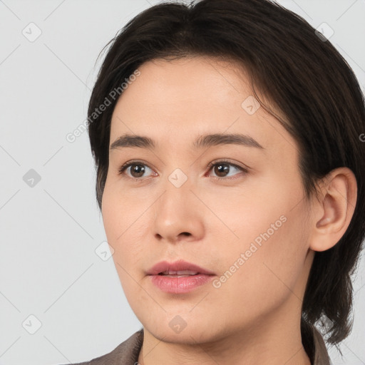 Neutral white young-adult female with medium  brown hair and brown eyes