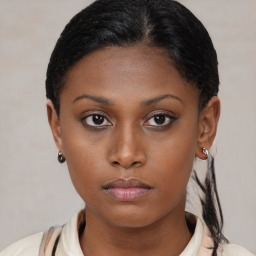 Neutral black young-adult female with short  brown hair and brown eyes