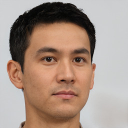 Neutral asian young-adult male with short  brown hair and brown eyes