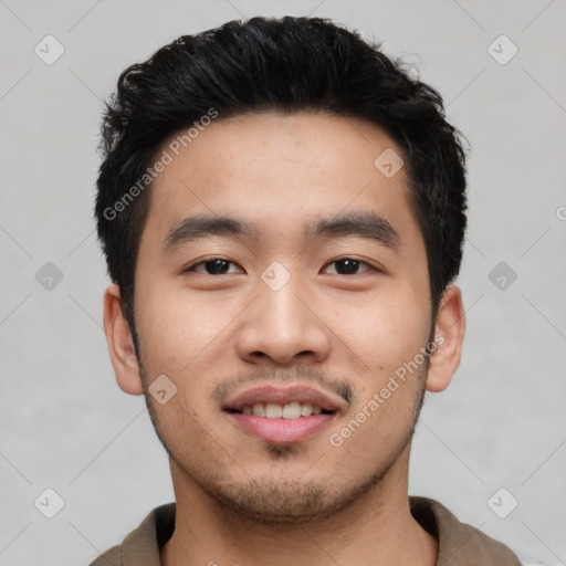 Joyful asian young-adult male with short  black hair and brown eyes