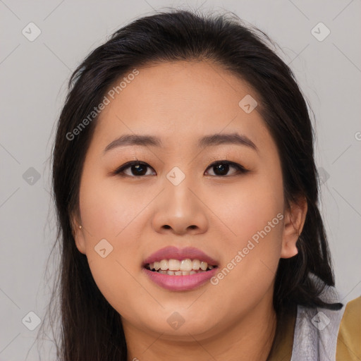 Joyful asian young-adult female with long  brown hair and brown eyes