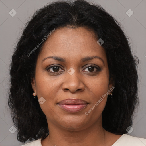 Joyful black young-adult female with medium  brown hair and brown eyes