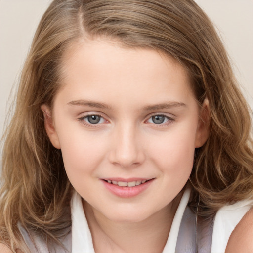 Joyful white child female with long  brown hair and brown eyes