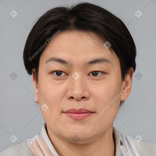 Joyful asian young-adult male with short  brown hair and brown eyes