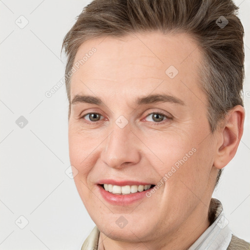 Joyful white adult female with short  brown hair and brown eyes