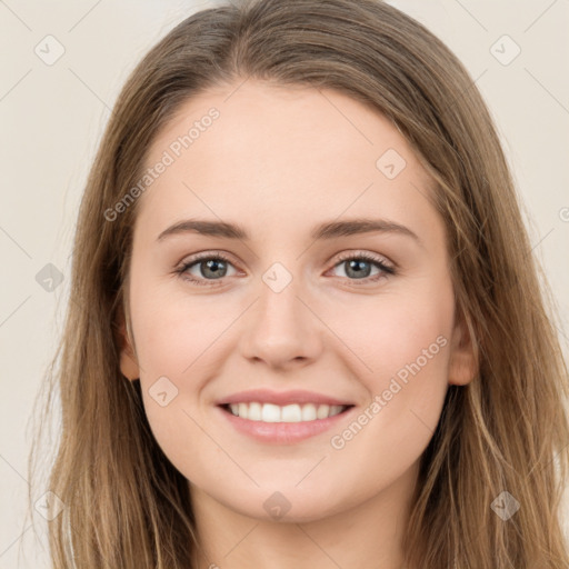 Joyful white young-adult female with long  brown hair and green eyes