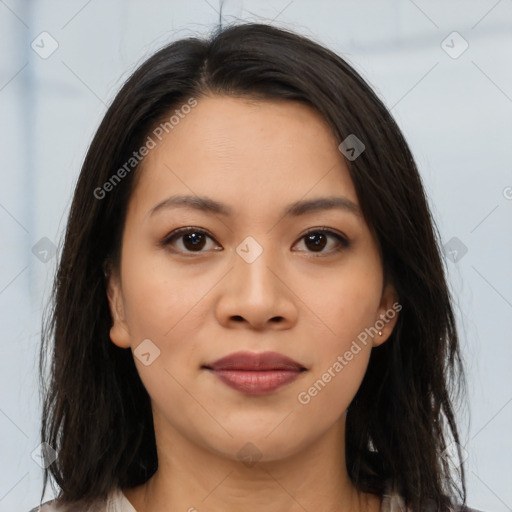 Joyful asian young-adult female with long  brown hair and brown eyes