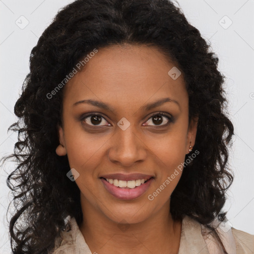 Joyful black young-adult female with long  brown hair and brown eyes