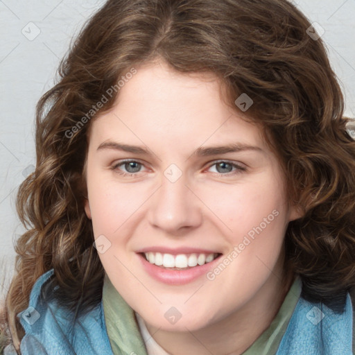 Joyful white young-adult female with medium  brown hair and blue eyes