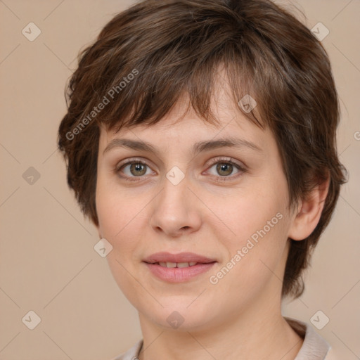 Joyful white young-adult female with medium  brown hair and green eyes