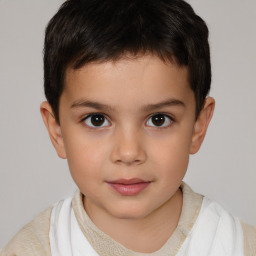 Joyful white child male with short  brown hair and brown eyes