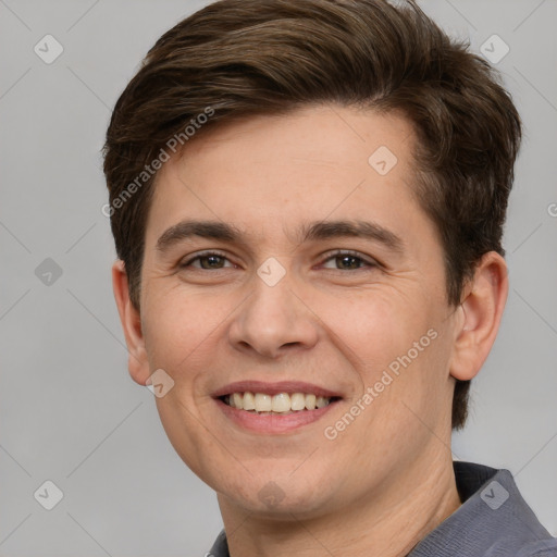 Joyful white adult male with short  brown hair and brown eyes