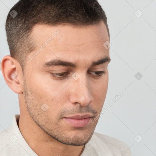 Neutral white young-adult male with short  brown hair and brown eyes