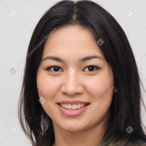 Joyful asian young-adult female with long  brown hair and brown eyes