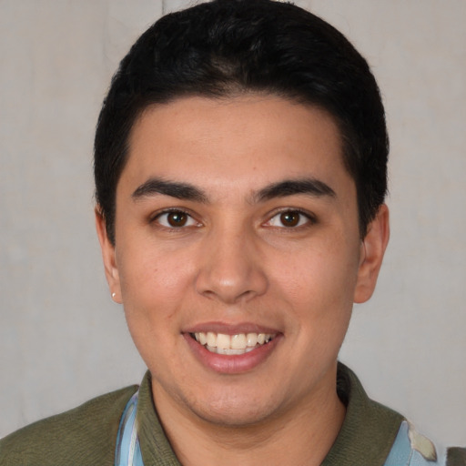 Joyful white young-adult male with short  black hair and brown eyes