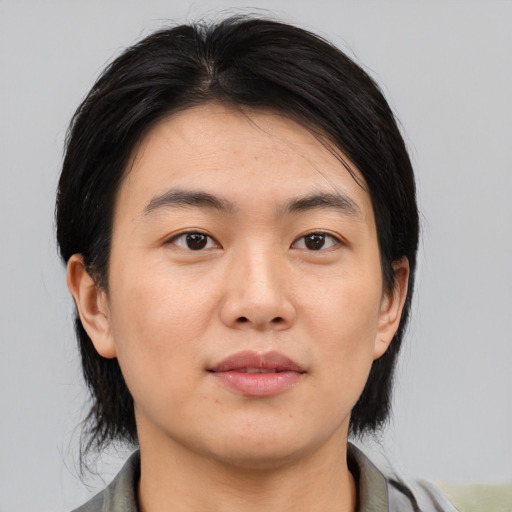 Neutral asian young-adult female with medium  black hair and brown eyes