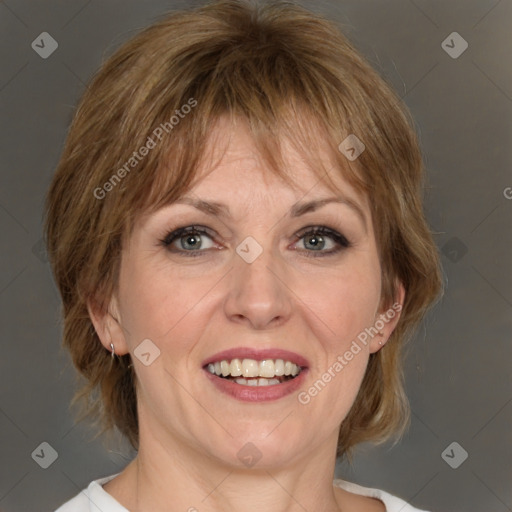 Joyful white adult female with medium  brown hair and grey eyes