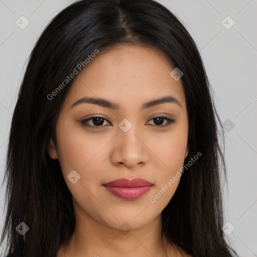 Joyful asian young-adult female with long  brown hair and brown eyes