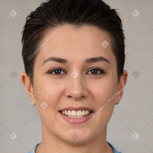 Joyful white young-adult female with short  brown hair and brown eyes