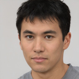 Neutral asian young-adult male with short  brown hair and brown eyes