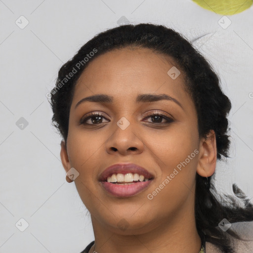 Joyful latino young-adult female with medium  black hair and brown eyes