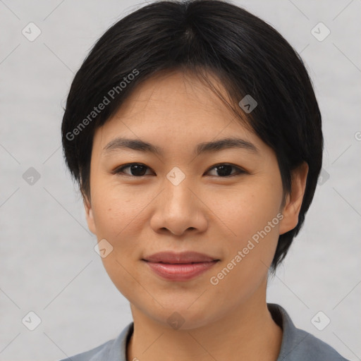 Joyful asian young-adult female with medium  black hair and brown eyes