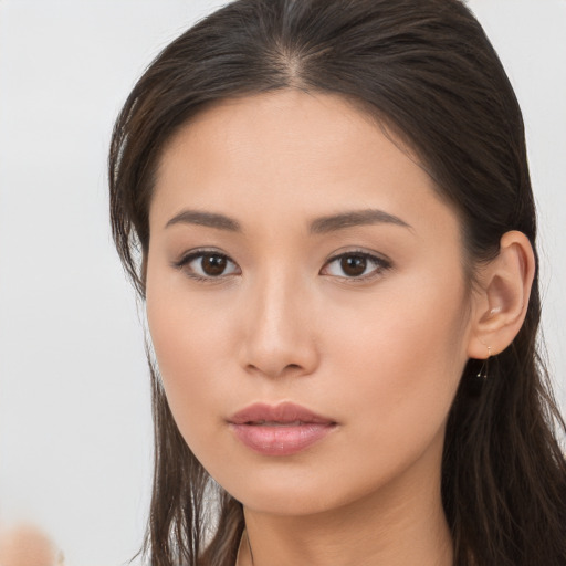 Neutral asian young-adult female with long  brown hair and brown eyes