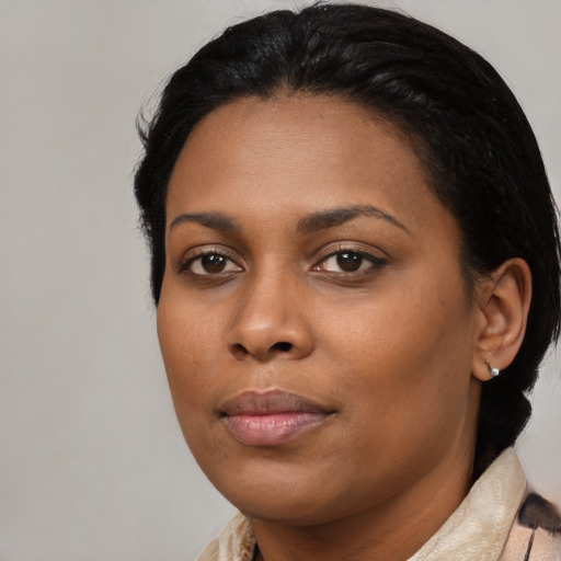 Neutral black young-adult female with medium  black hair and brown eyes