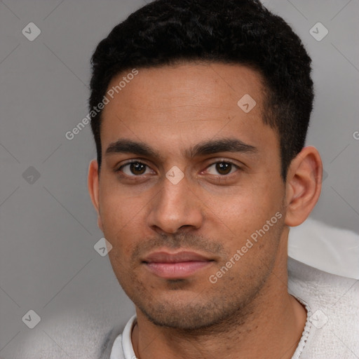 Neutral white young-adult male with short  black hair and brown eyes
