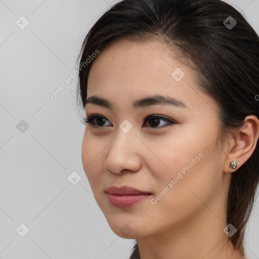 Neutral asian young-adult female with medium  brown hair and brown eyes