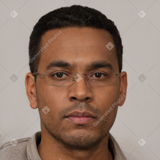 Neutral latino young-adult male with short  black hair and brown eyes